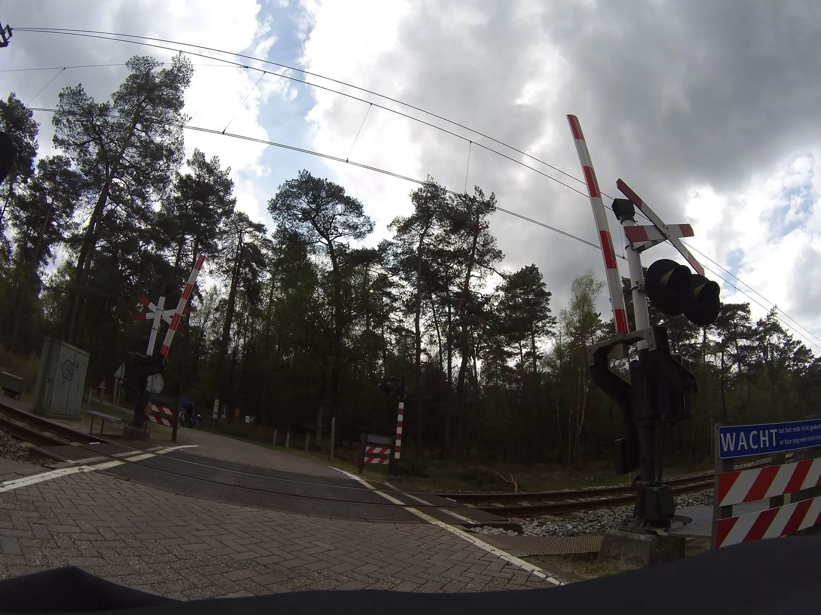 Street-level view of a level crossing in the Netherlands