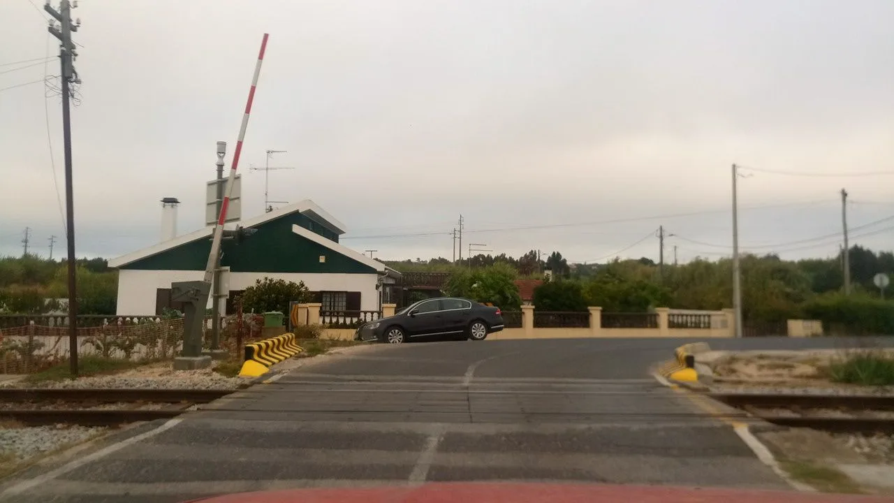 Street-level view of a level crossing in Portugal